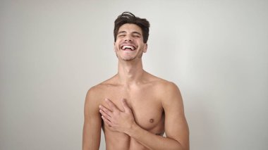 Young hispanic man smiling confident standing over isolated white background