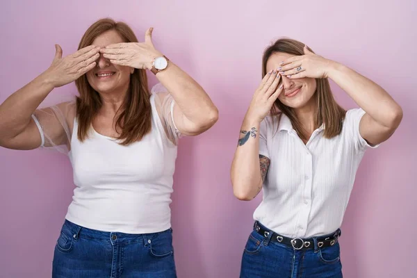 Hispanic Mother Daughter Wearing Casual White Shirt Pink Background Covering — Stock Photo, Image
