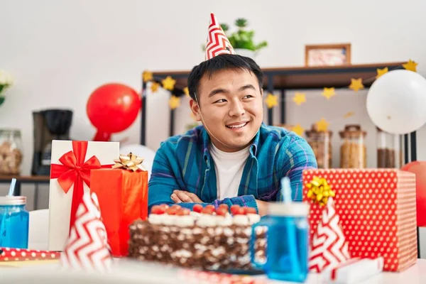 Young Chinese Man Celebrating Birthday Sitting Table Home — Foto Stock