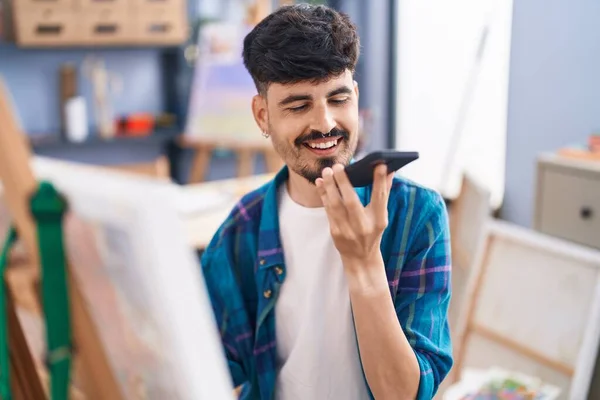 Young Hispanic Man Artist Talking Smartphone Drawing Art Studio — Φωτογραφία Αρχείου
