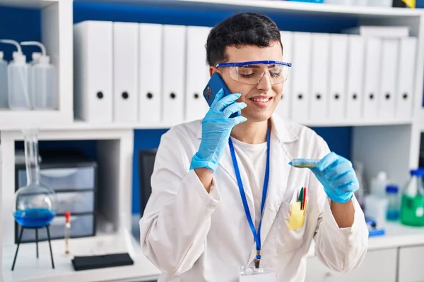 Young Non Binary Man Scientist Talking Smartphone Holding Sample Laboratory — Stock Photo, Image