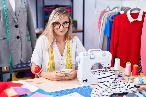 Young Blonde Woman Tailor Smiling Confident Using Smartphone Tailor Shop — Stock Photo, Image