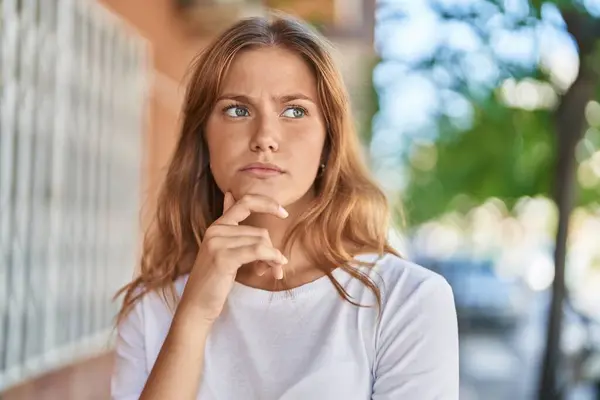 Young Blonde Girl Standing Doubt Expression Street — Stock Photo, Image