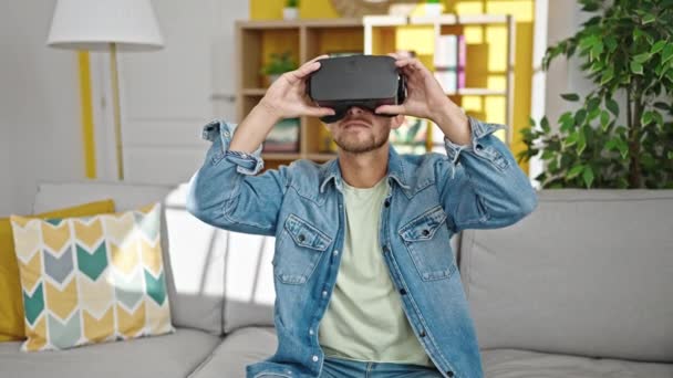 Young Caucasian Man Playing Video Game Using Virtual Reality Glasses — Stock videók