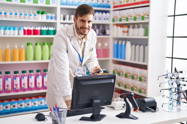 Young Caucasian Man Pharmacist Using Smartphone Computer Pharmacy — 스톡 사진