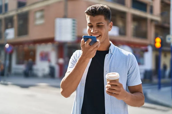 Joven Hispano Hablando Smartphone Tomando Café Calle —  Fotos de Stock