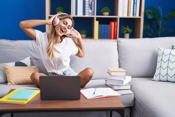Young Blonde Woman Student Sitting Sofa Listening Music Dancing Home — Stockfoto