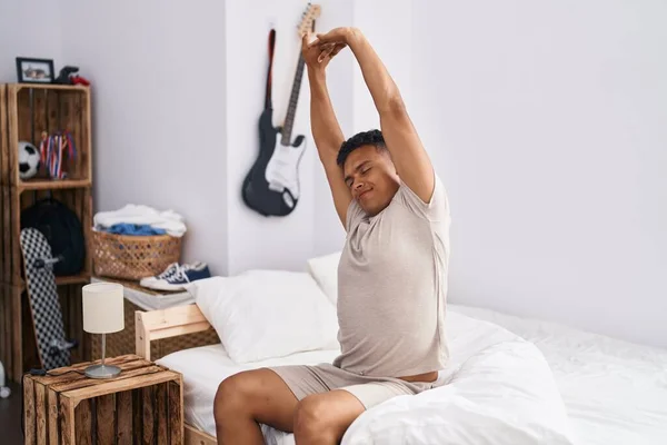Young Latin Man Waking Stretching Arms Bedroom — Stock Photo, Image