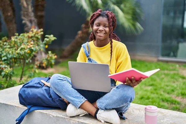 African American Woman Student Using Laptop Reading Book Campus Park — Stock Photo, Image