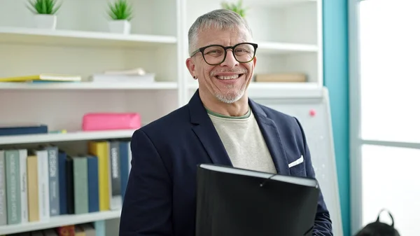 Middle Age Grey Haired Man Teacher Smiling Confident Holding Folder — ストック写真