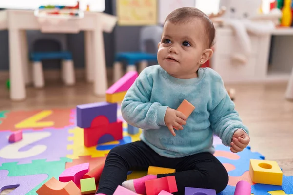 Adorable Hispanic Baby Playing Construction Blocks Sitting Floor Kindergarten — Stok fotoğraf