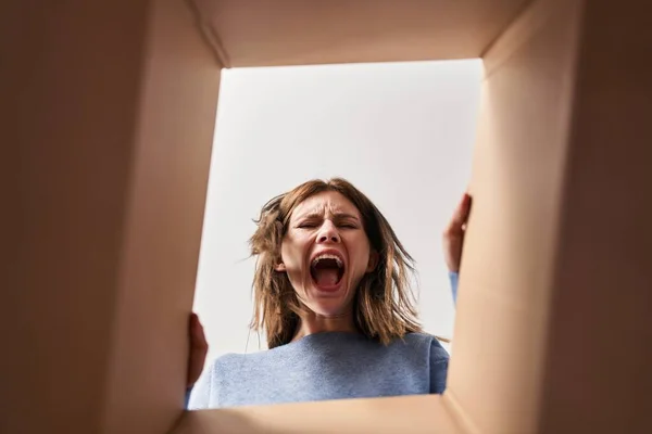 Beautiful Woman Opening Cardboard Box Angry Mad Screaming Frustrated Furious — Stock Photo, Image