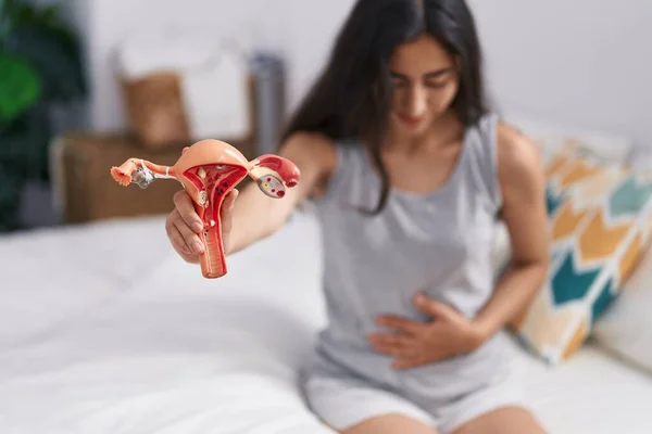 Young Hispanic Girl Suffering Menstrual Pain Sitting Bed Bedroom — Stok Foto