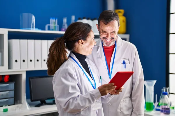 Middle Age Man Woman Scientists Using Touchpad Working Laboratory — Stock Photo, Image