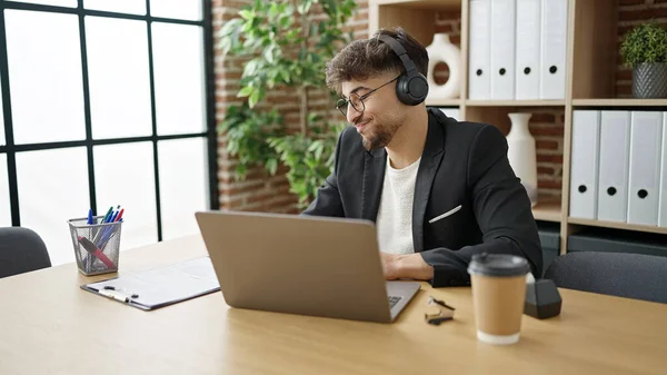 stock image Young arab man business worker having video call working at office