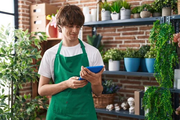 Young Blond Man Florist Smiling Confident Using Touchpad Flower Shop — Stockfoto