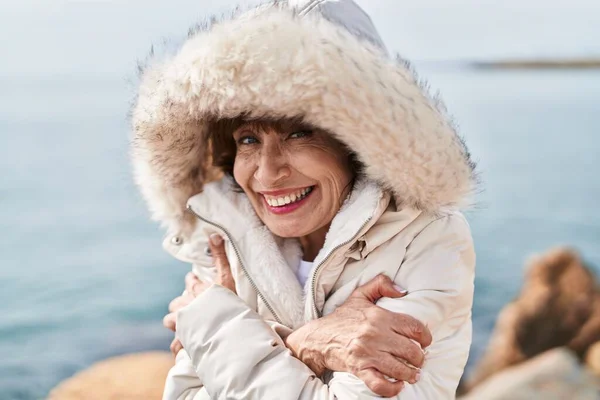Middle Age Woman Smiling Confident Freezing Seaside — Stock Photo, Image