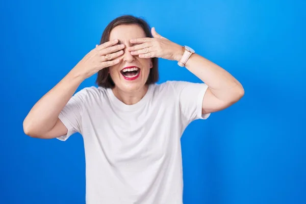 Middle Age Hispanic Woman Standing Blue Background Covering Eyes Hands — Stock Photo, Image