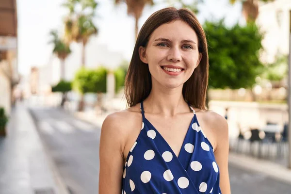 stock image Young blonde woman smiling confident standing at street