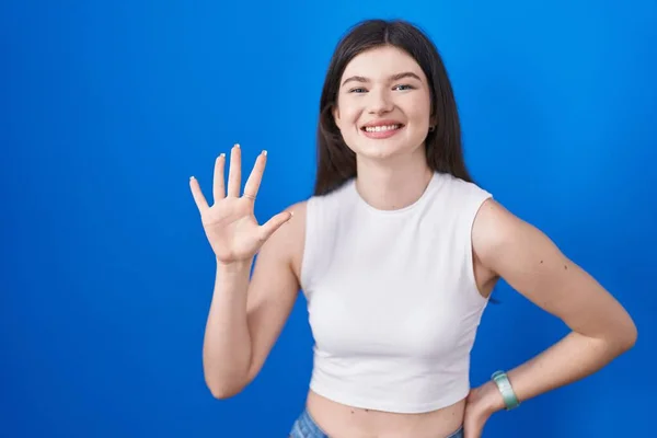 Young Caucasian Woman Standing Blue Background Showing Pointing Fingers Number — Stockfoto
