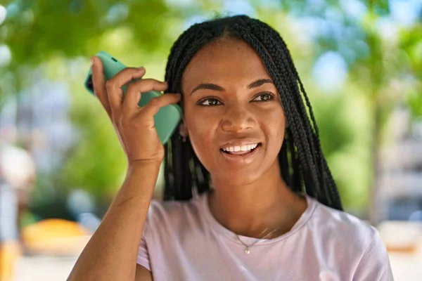 African American Woman Smiling Confident Listening Audio Message Smartphone Park — Fotografia de Stock