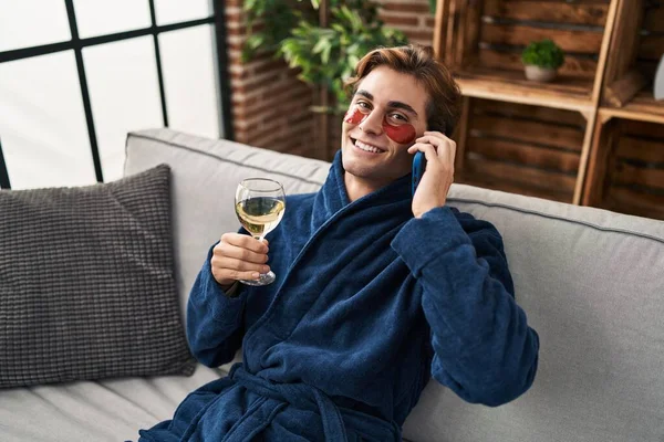 Young Caucasian Man Wearing Eye Patches Talking Smartphone Home — Foto Stock
