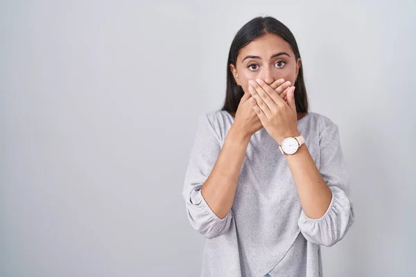 Young Hispanic Woman Standing White Background Shocked Covering Mouth Hands — Foto Stock