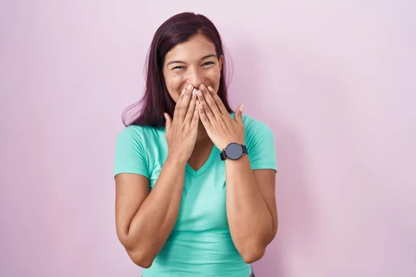 Young Hispanic Woman Standing Pink Background Laughing Embarrassed Giggle Covering — Stock Photo, Image