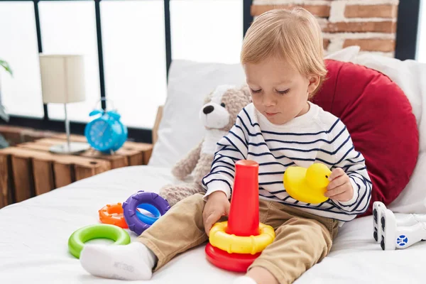 Adorable Caucasian Boy Playing Hoops Game Holding Duck Toy Sitting — Stock Photo, Image
