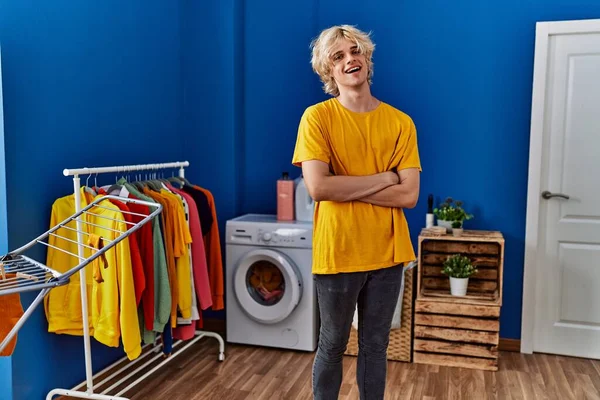 Young Blond Man Smiling Confident Standing Arms Crossed Gesture Laundry — ストック写真