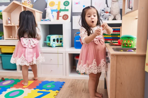 Adorable Twin Girls Playing Play Kitchen Standing Kindergarten — Stock Photo, Image