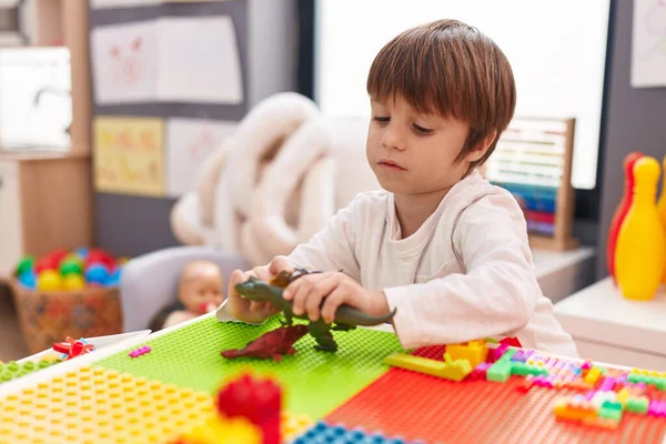 Adorable Caucasian Boy Playing Dinosaur Toy Sitting Table Kindergarten — Stock Photo, Image