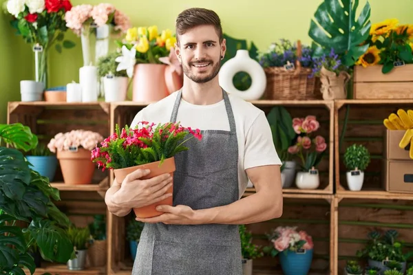 Hispanic Man Beard Working Florist Shop Holding Plant Looking Positive — Stock Photo, Image