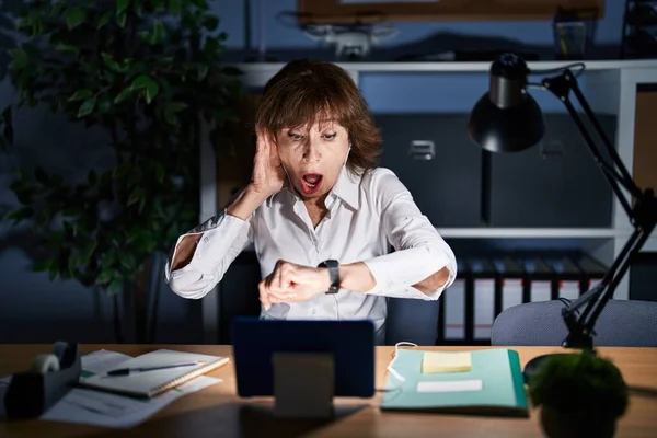 Middle Age Woman Working Office Night Looking Watch Time Worried — Stock Photo, Image