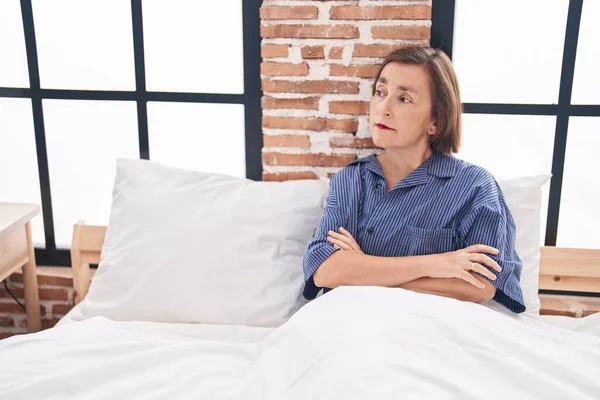 Middle Age Woman Sitting Bed Unhappy Expression Arms Crossed Gesture — Stock Photo, Image