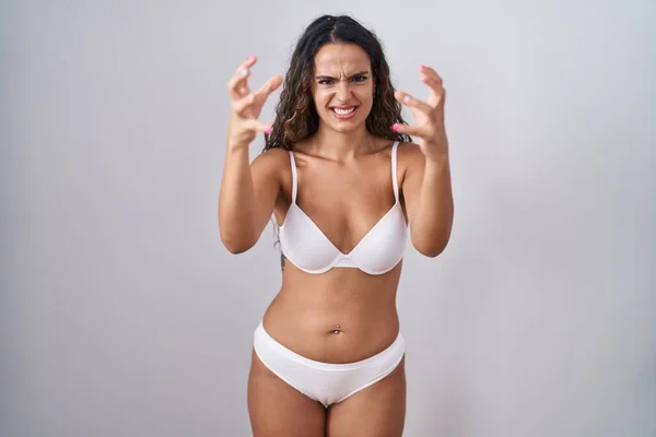 Young Hispanic Woman Wearing White Lingerie Shouting Frustrated Rage Hands — Stock Photo, Image