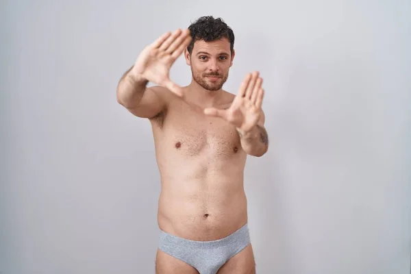 Young Hispanic Man Standing Shirtless Wearing Underware Doing Frame Using — Stock Photo, Image