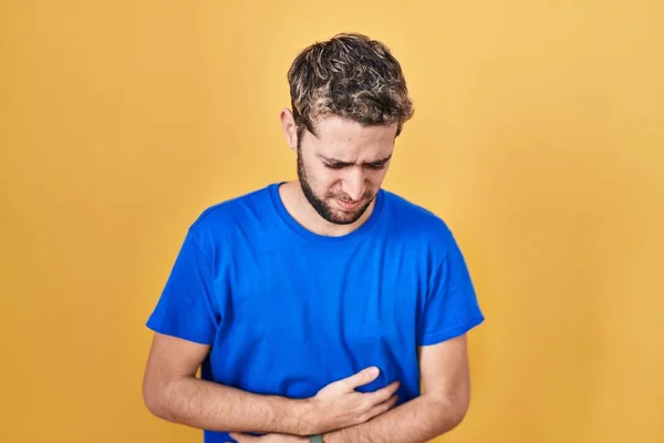 Hispanic Man Beard Standing Yellow Background Hand Stomach Because Indigestion — Foto de Stock
