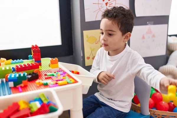 Adorable Hispanic Boy Playing Construction Blocks Sitting Table Kindergarten — Stock Photo, Image