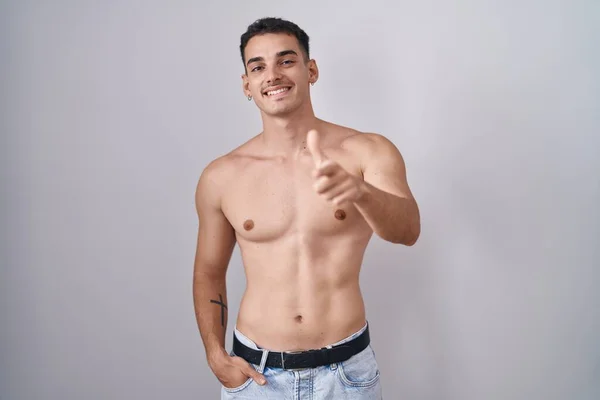 Handsome Hispanic Man Standing Shirtless Pointing Fingers Camera Happy Funny — 图库照片