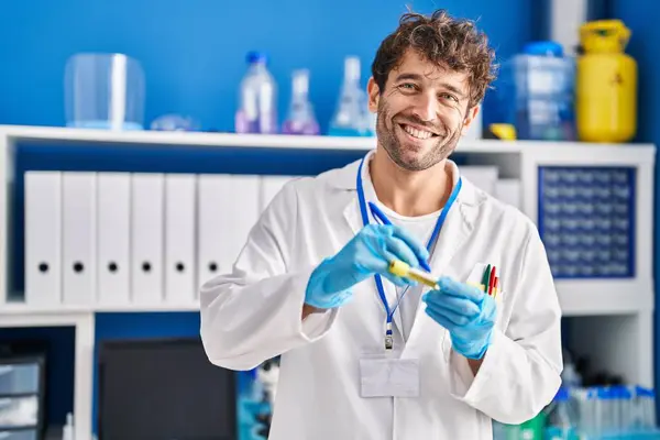 Young Man Scientist Smiling Confident Writing Test Tube Laboratory — Foto Stock