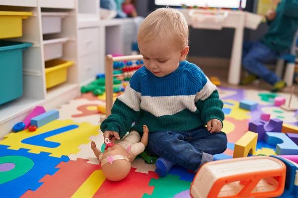Adorable Caucasian Boy Playing Toys Sitting Floor Kindergarten — Stock Fotó