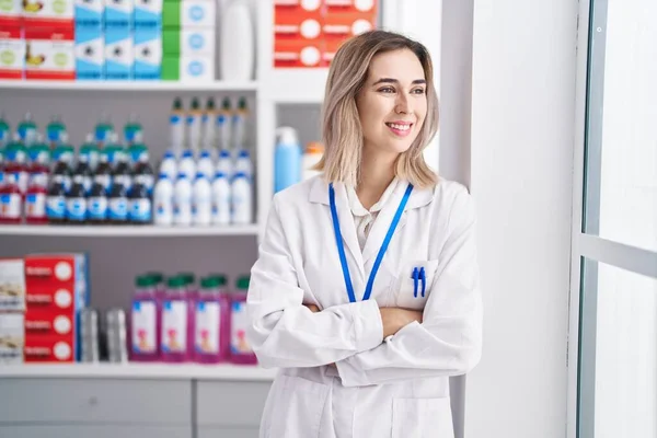 Young Woman Pharmacist Smiling Confident Standing Arms Crossed Gesture Pharmacy — Stok fotoğraf