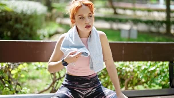 Young Redhead Woman Looking Watch Wipe Sweat Park — Stock Video