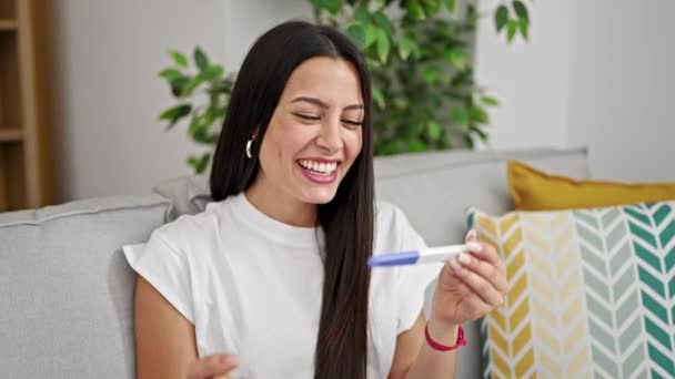 Young Beautiful Hispanic Woman Smiling Confident Holding Pregnancy Test Home — Stock Video