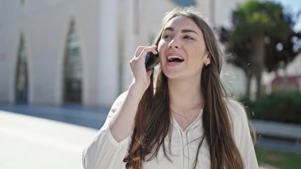 Young Beautiful Hispanic Woman Smiling Confident Talking Smartphone Street — Stockvideo