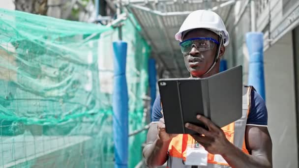 African American Man Builder Using Touchpad Construction Place — Stock Video