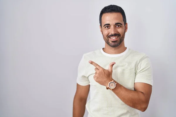 Hispanic Man Beard Standing Isolated Background Cheerful Smile Face Pointing — Stock Photo, Image