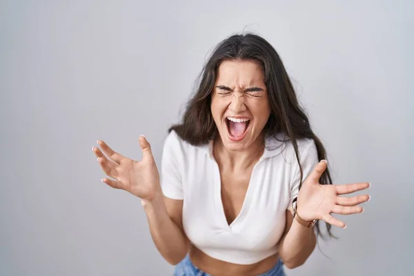 Beyaz Arka Planda Duran Genç Kız Başarı Için Kızgın Çılgınlığı — Stok fotoğraf