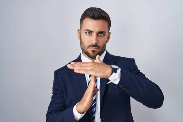 Handsome Hispanic Man Wearing Suit Tie Doing Time Out Gesture — Stock Photo, Image